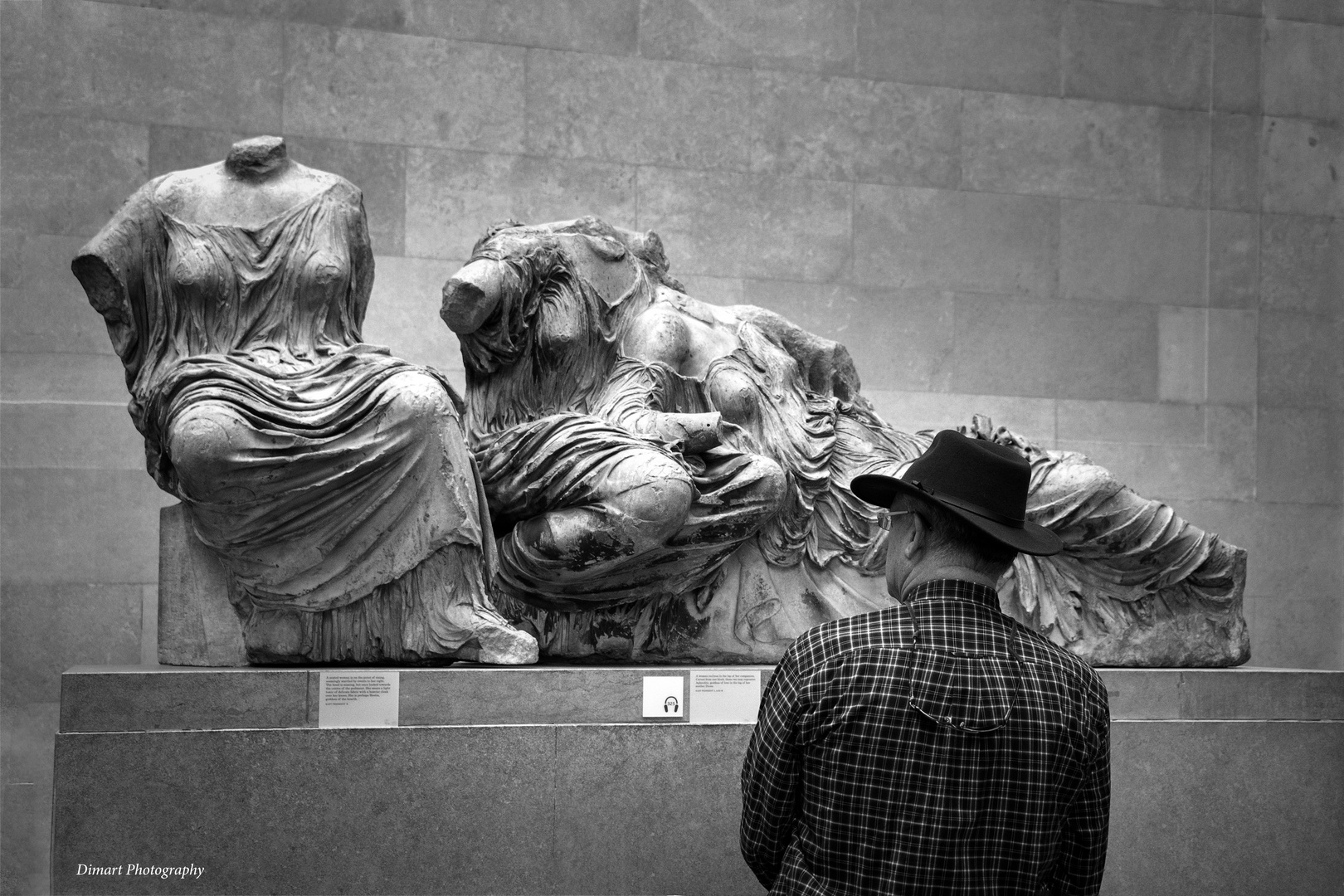 an American in the British Museum admiring the Greek sculptures of Parthenon