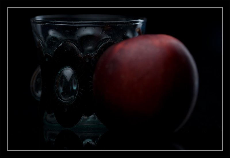 An apple and an ancient glass