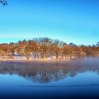 An einem Wintermorgen wenn der See noch dampft