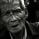 An old beggar in Phnom Penh, Cambodia