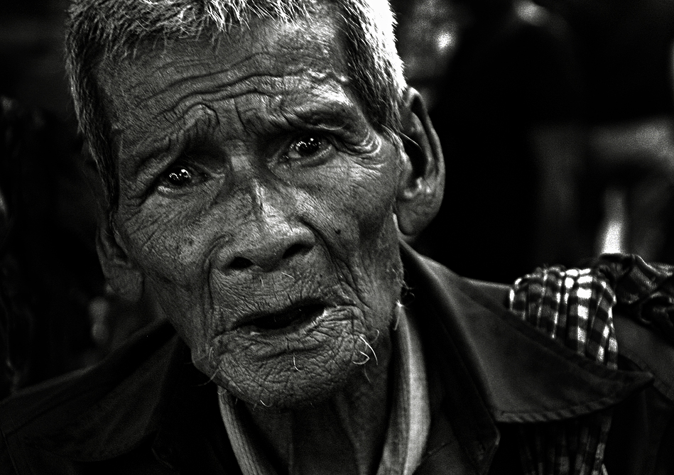 An old beggar in Phnom Penh, Cambodia