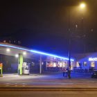 An old car service station is the burger place