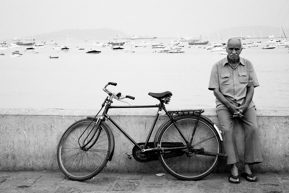 An old man and his bicycle