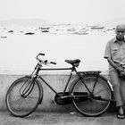 An old man and his bicycle