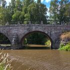 An old stone bridge over the Vantaa river