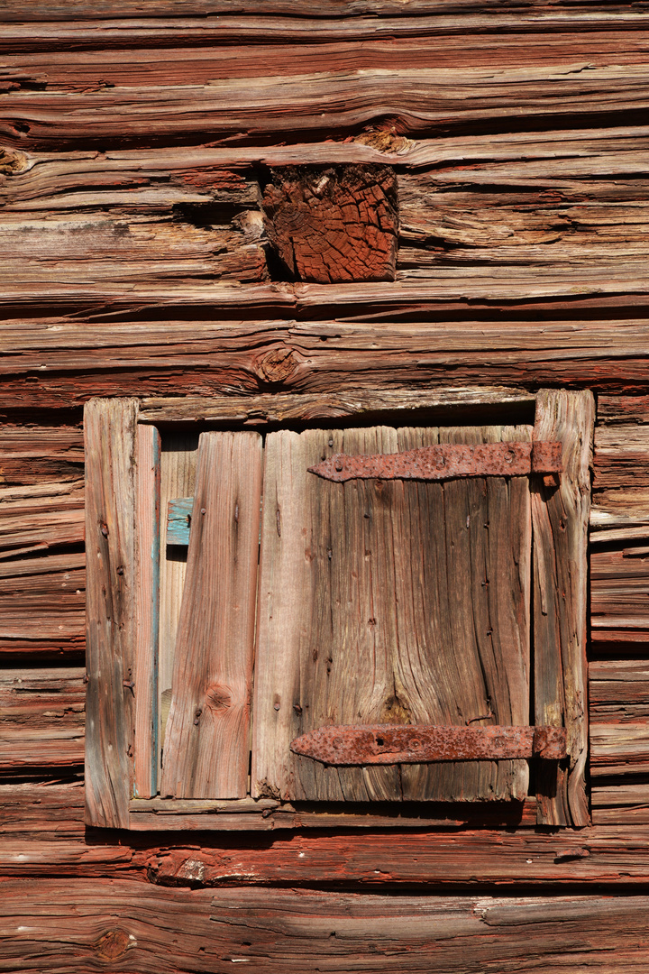 An old wooden house and it air condition shutter