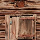 An old wooden house and it air condition shutter