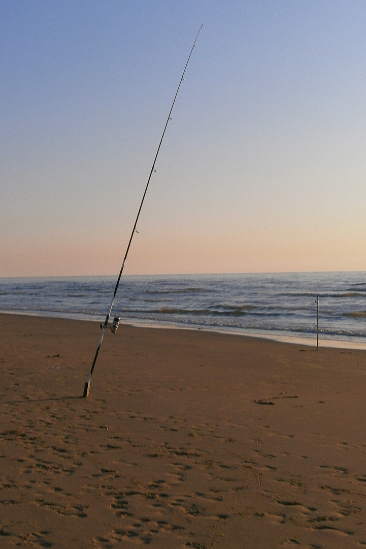 Angel am Strand