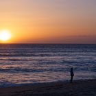 Angler am Strand am Ende der Welt