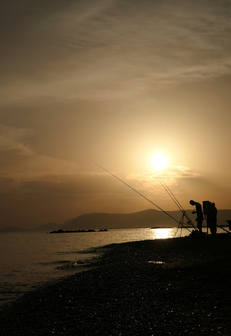 Angler an der ligurischen Küste