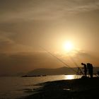 Angler an der ligurischen Küste