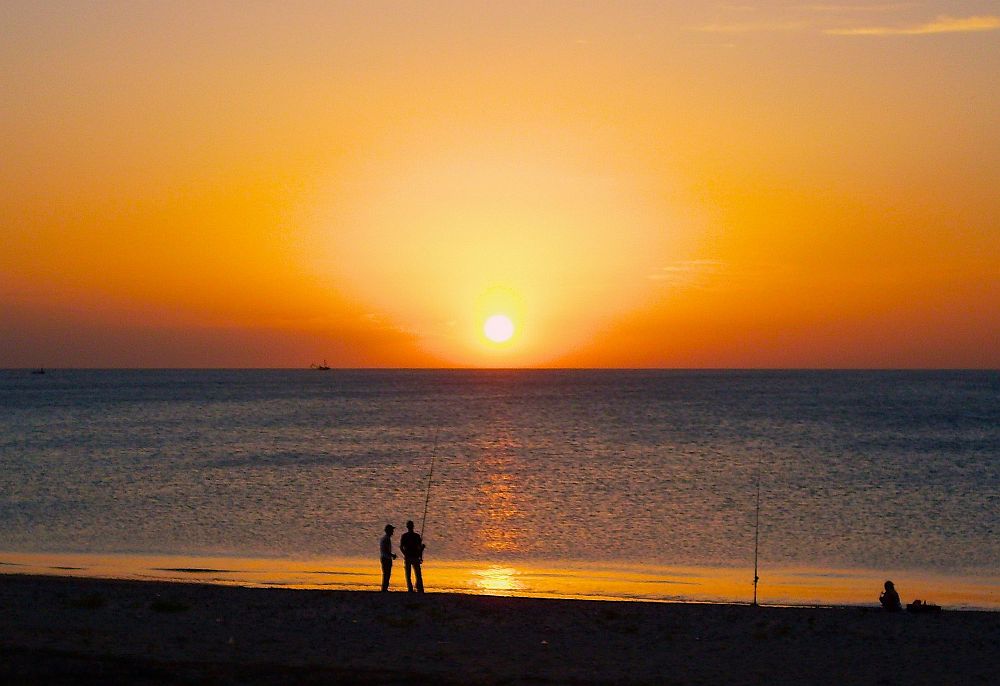 Angler au coucher du soleil