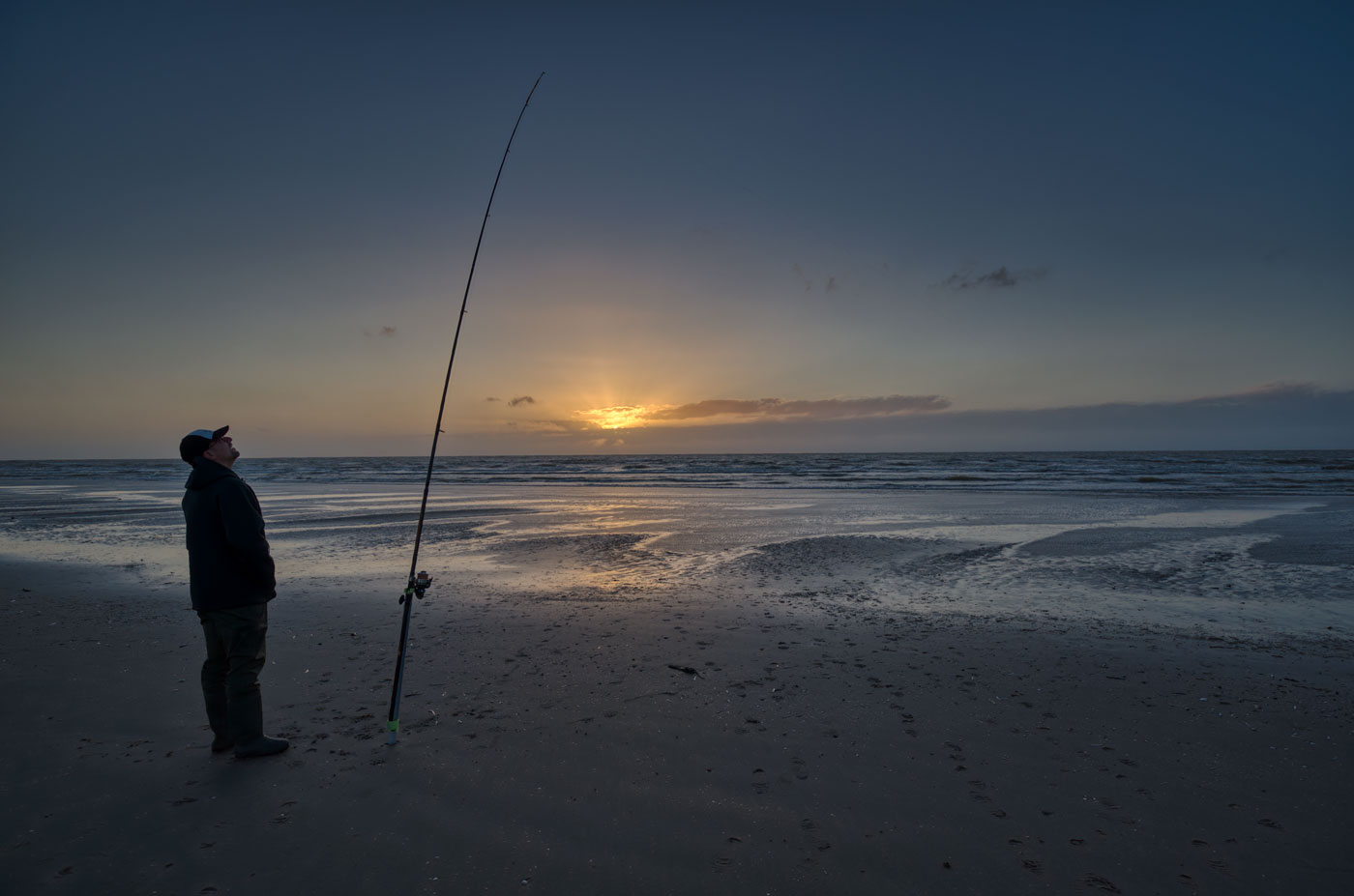 Angler bei Ebbe an der Nordsee