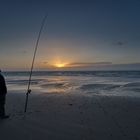 Angler bei Ebbe an der Nordsee