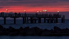 ANGLER BEI SONNENUNTERGANG