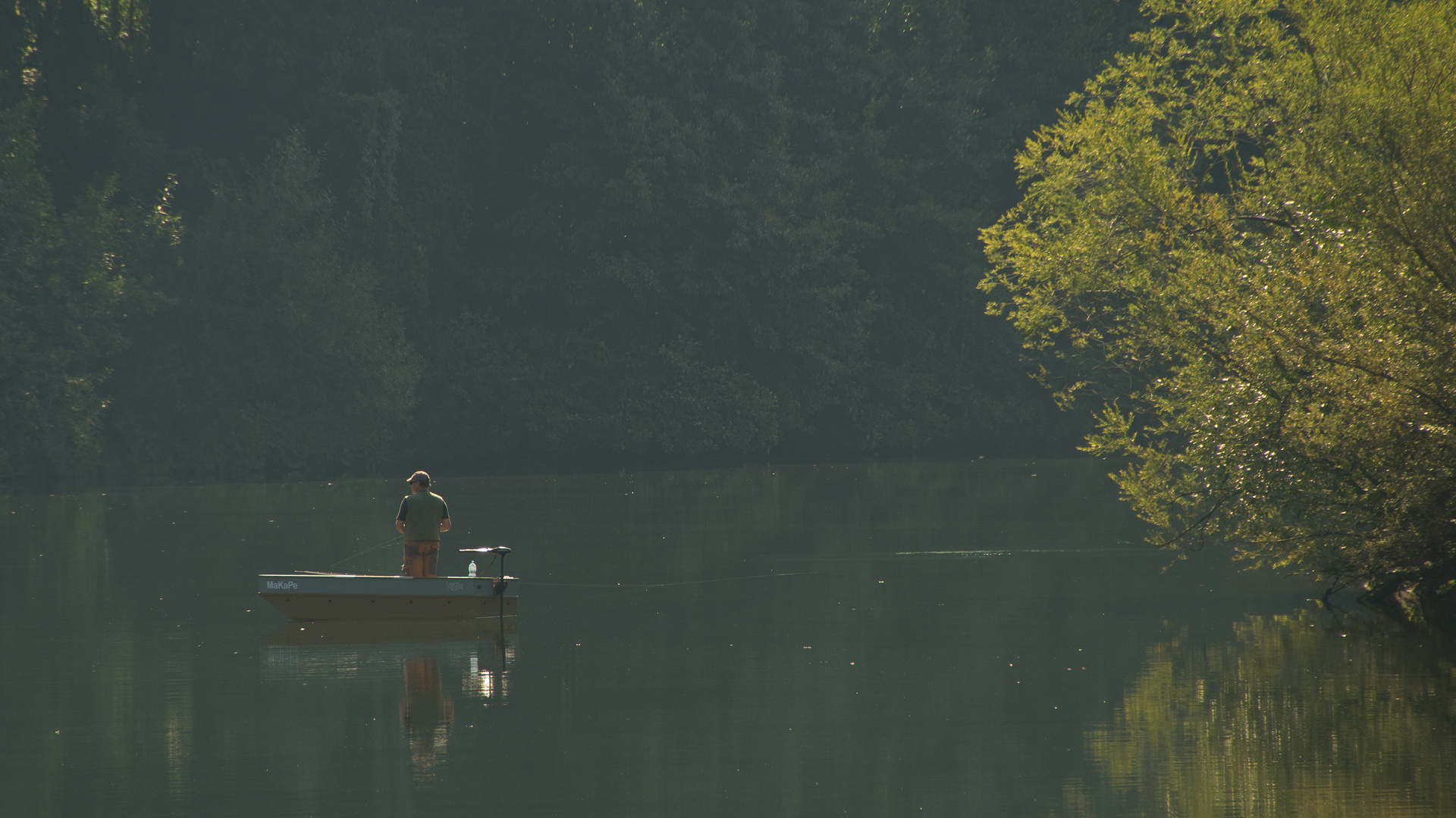 Angler im Dunst