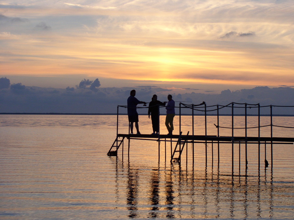 Angler im Gegenlicht