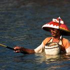 Angler im Meer bei den Gili-Islands