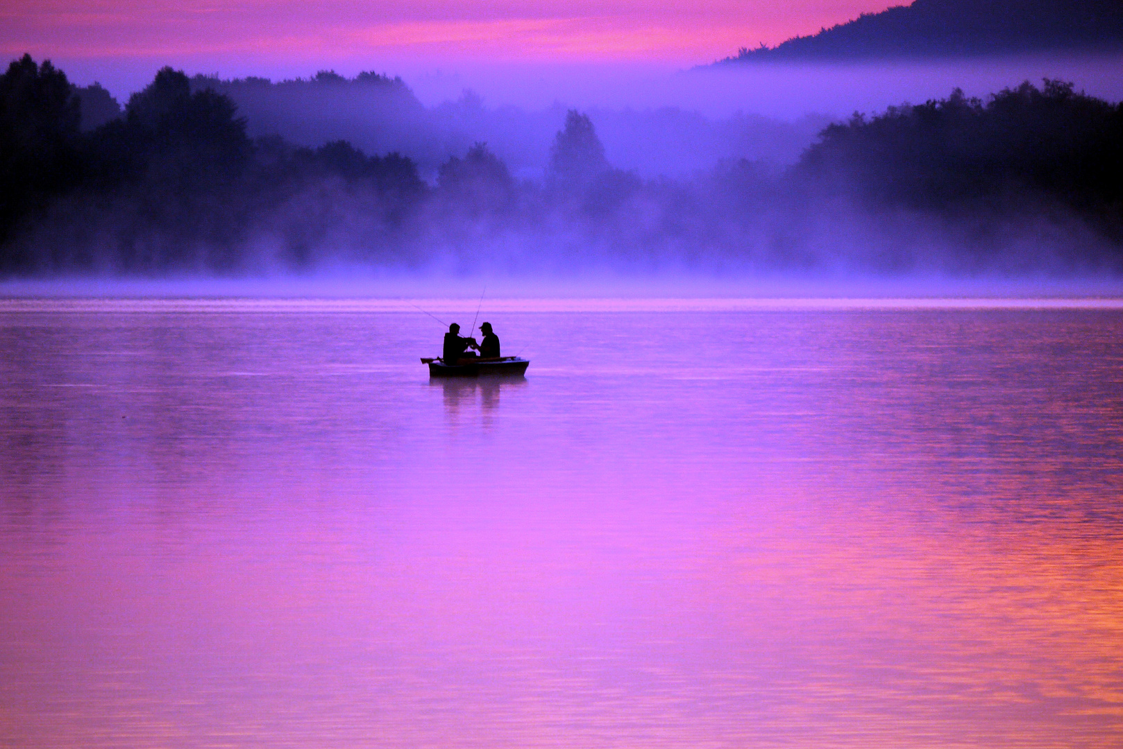 Angler im Morgengrauen