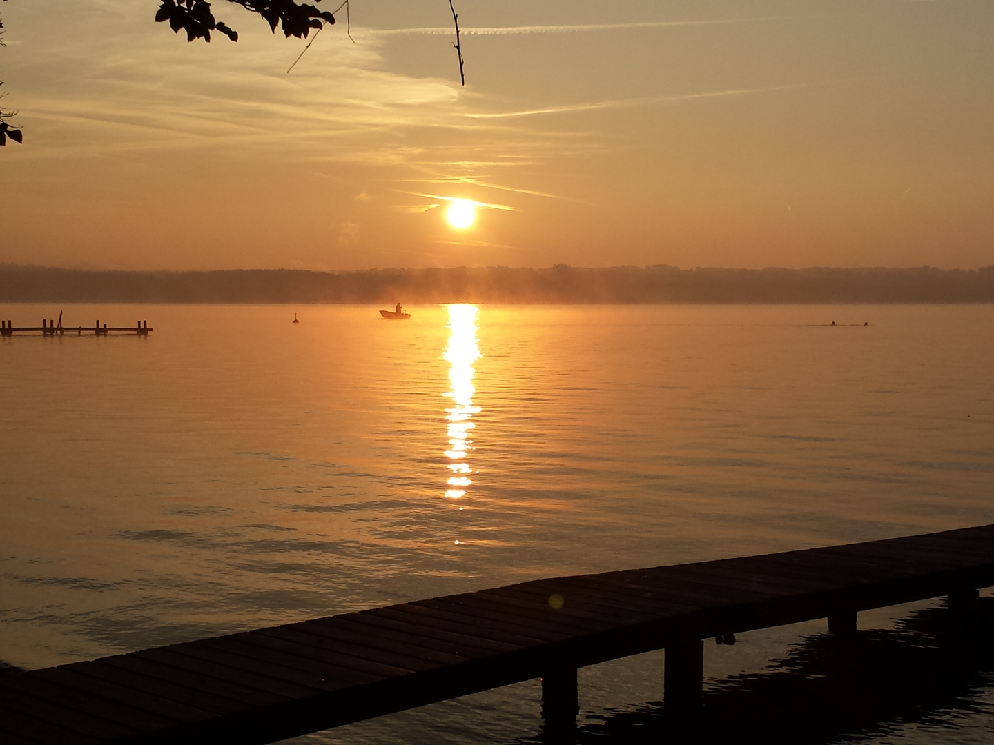 Angler im Morgenlicht