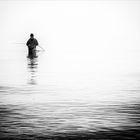 Angler im Nebel