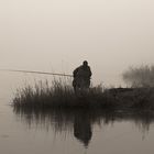 Angler im Nebel