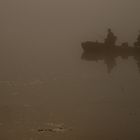 Angler im Nebel