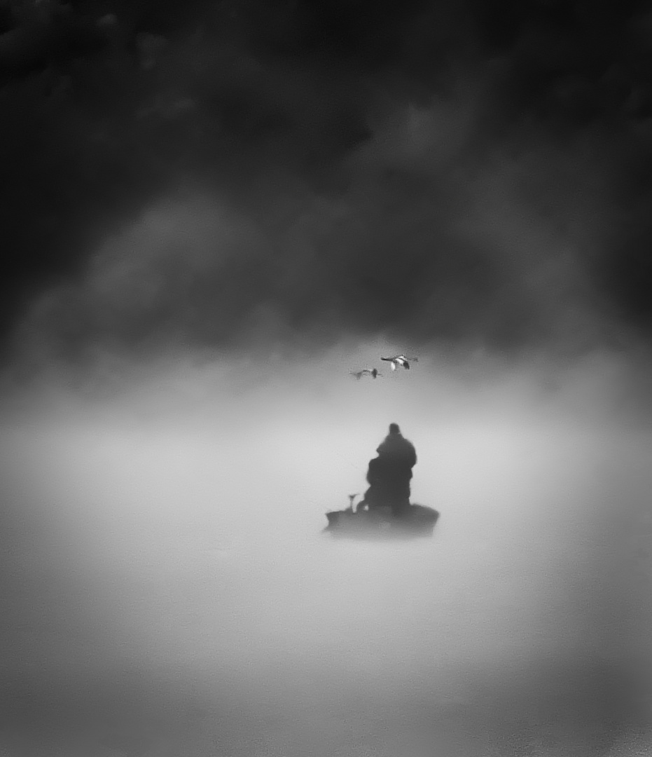 Angler im Nebel