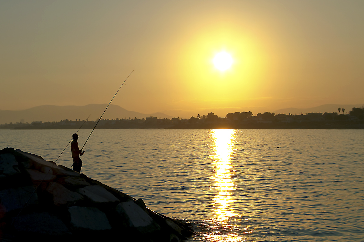 Angler in der Abendsonne