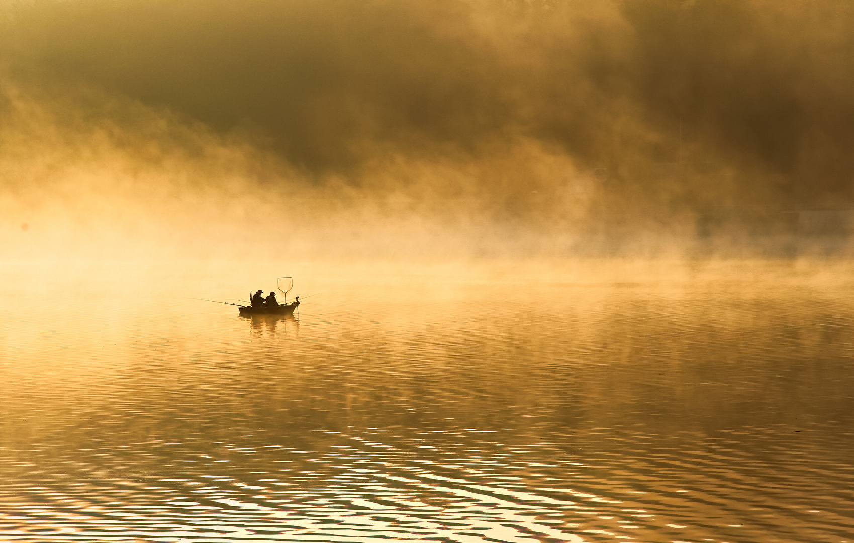 Angler in der Morgensonne