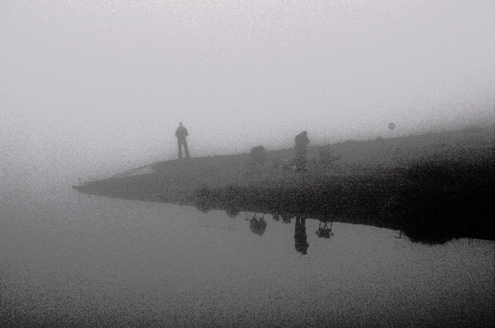 Angler in Nebel