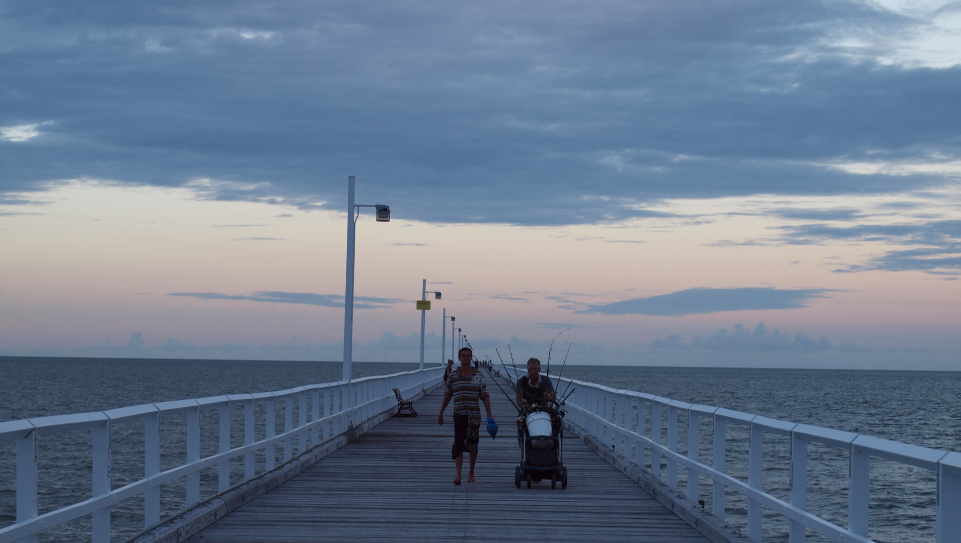 Angler on Urangan Pier Hervey Bay Fraser Island Queensland Australia