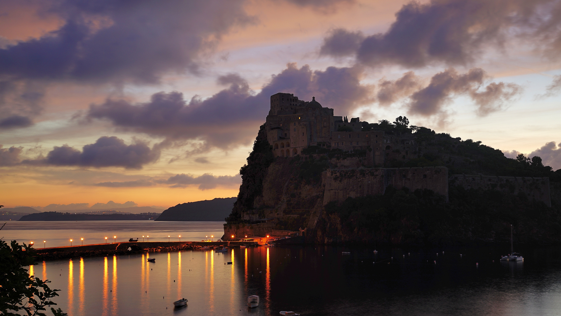 aragon castle in twilight, ischia, italy