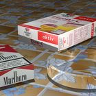 Aschenbecher, Marlboro und Doppelherz