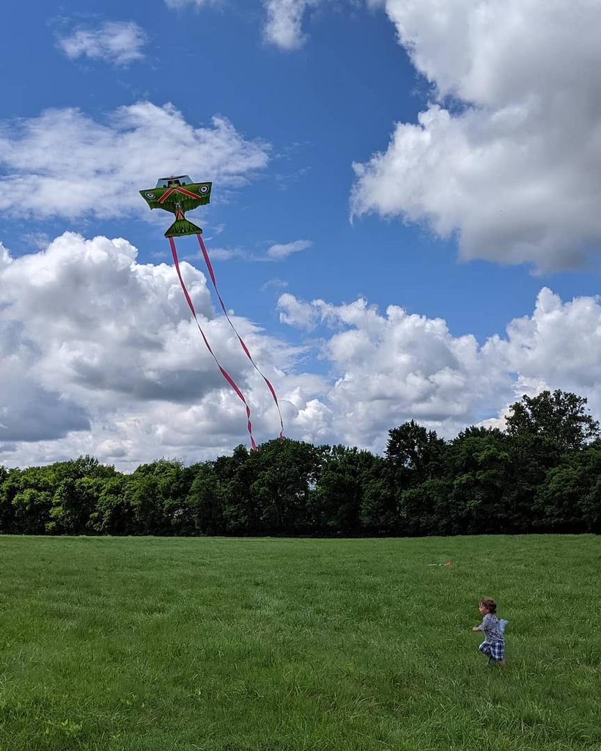 Asher chases a kite