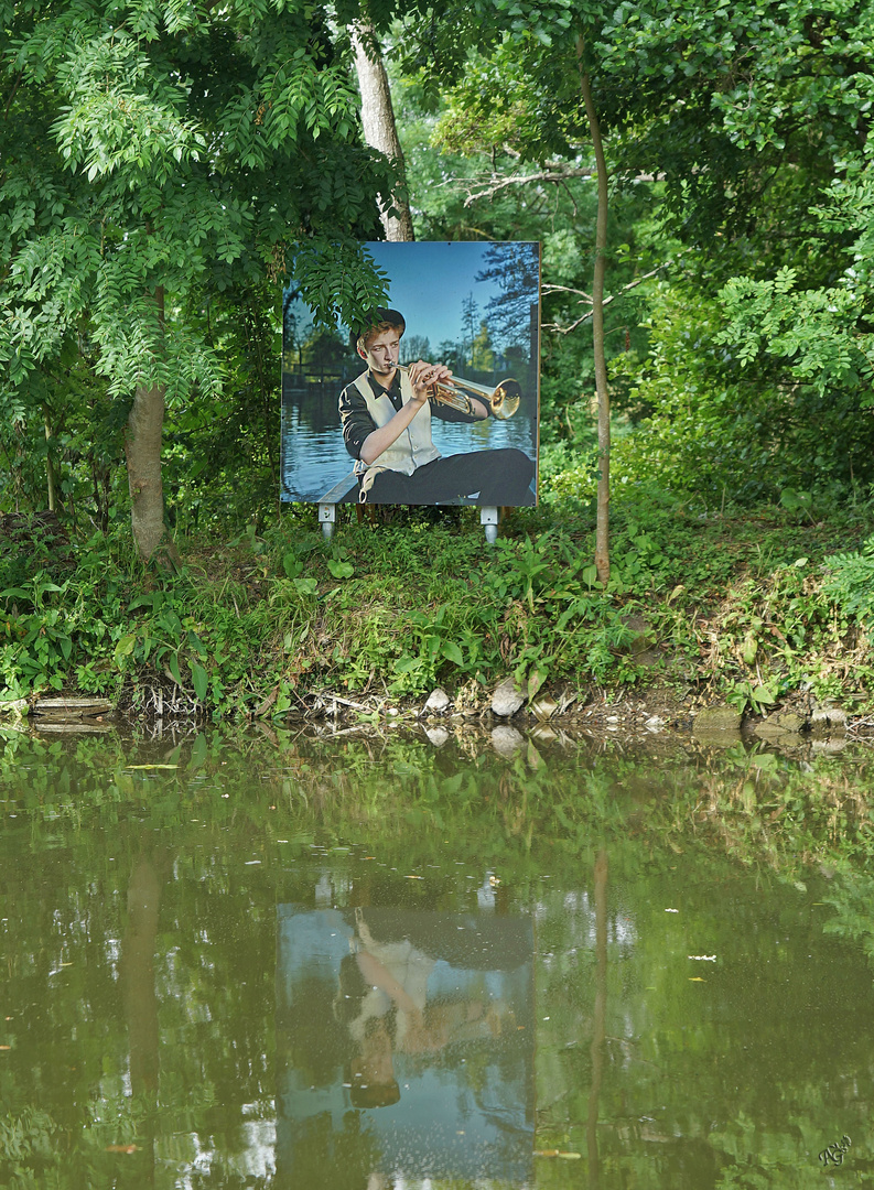 Au bord de la rivière, le trompettiste 