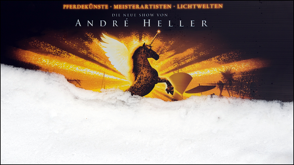 Auch André  Heller versinkt im Schnee....