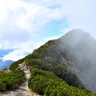 Auf dem Herzogstand bei Nebel und Sonne