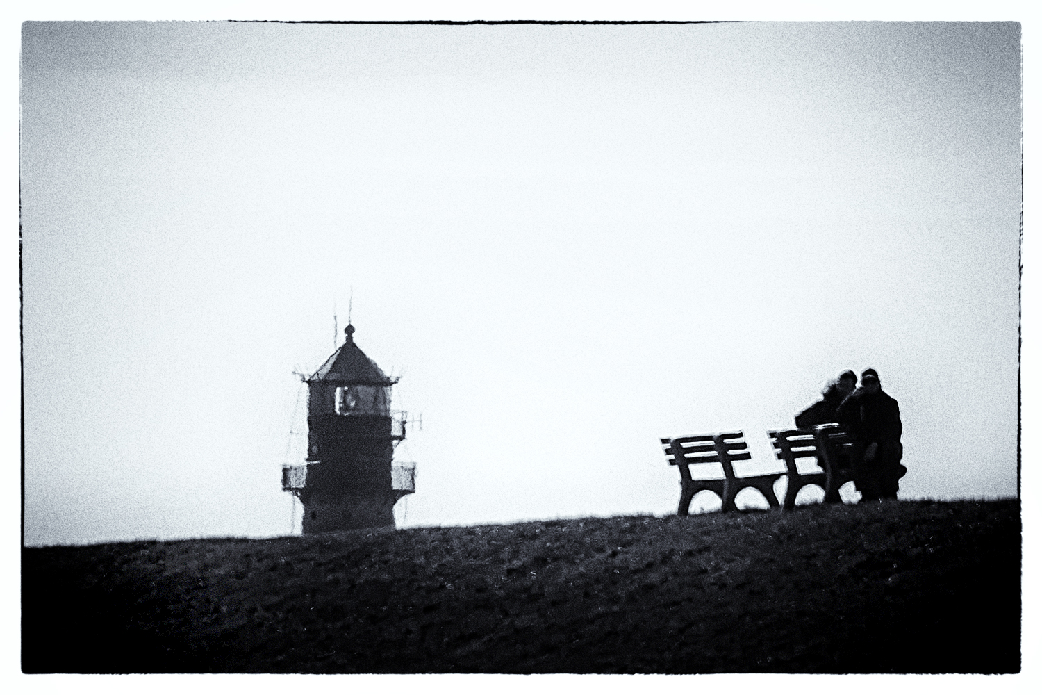 Auf der Bank vor dem Leuchtturm Westerhever