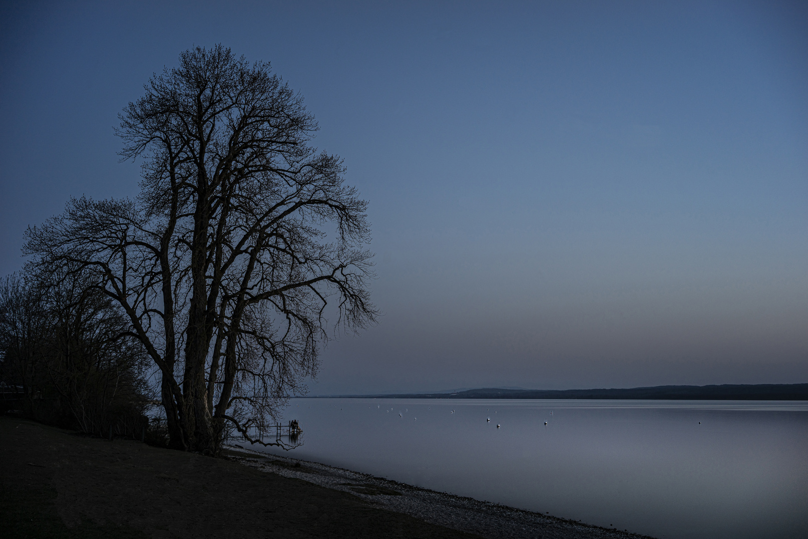 Auf einem Steg am Ammersee