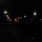 Ausfahrt einer RE aus dem Bahnhof Oelde/Münsterland bei Nacht