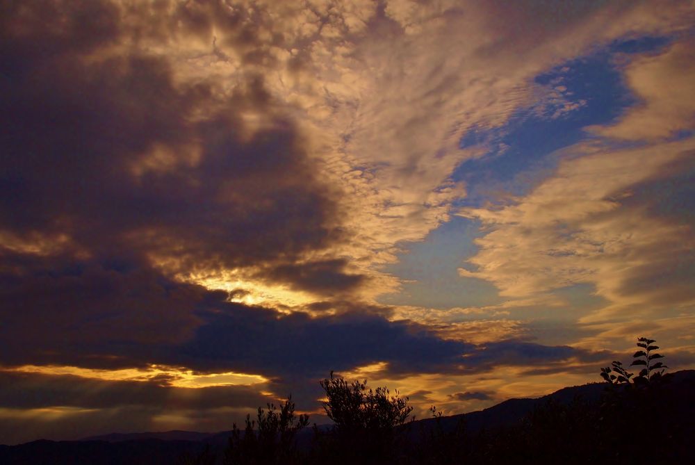 avant la tempete au coucher du soleil by claudine capello 