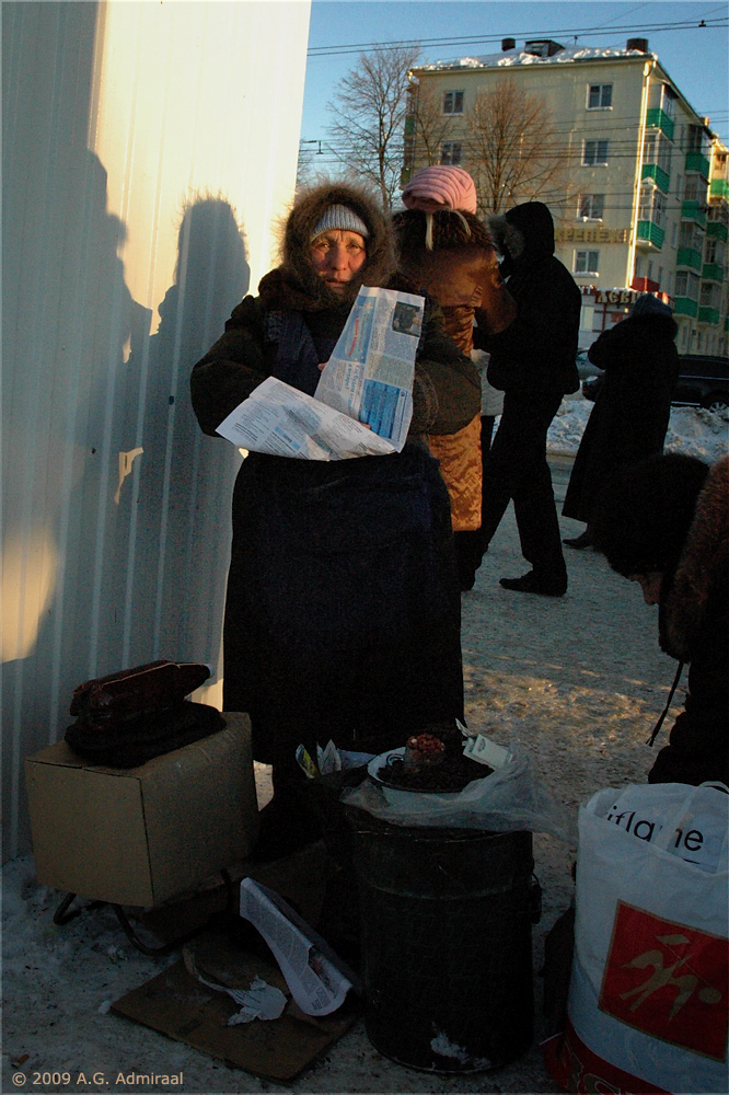 Babushka selling hot nuts