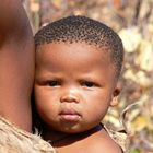 Baby der Buschmänner im Historic Living Villiage Grashoek, Namibia