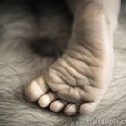 Baby foot & Father's Belly