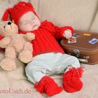 baby mit koffer