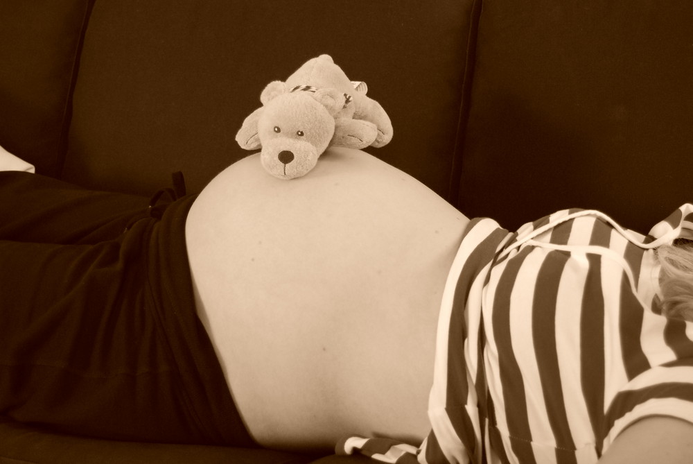 Babybauch mit Badebär