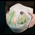 Babybauch mit Unterwasserlandschaft