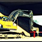 Bagger mit Schranke und Gegenüber