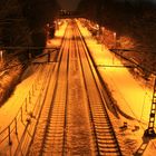 Bahnhof bei Dortmund bei Nacht im Schnee